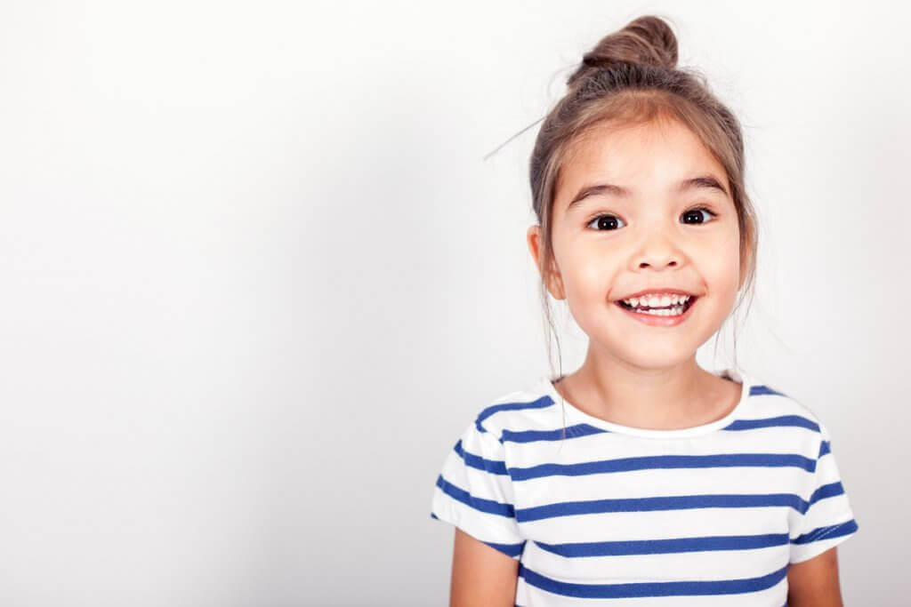 dental check ups for primary students, happy smiling young girl